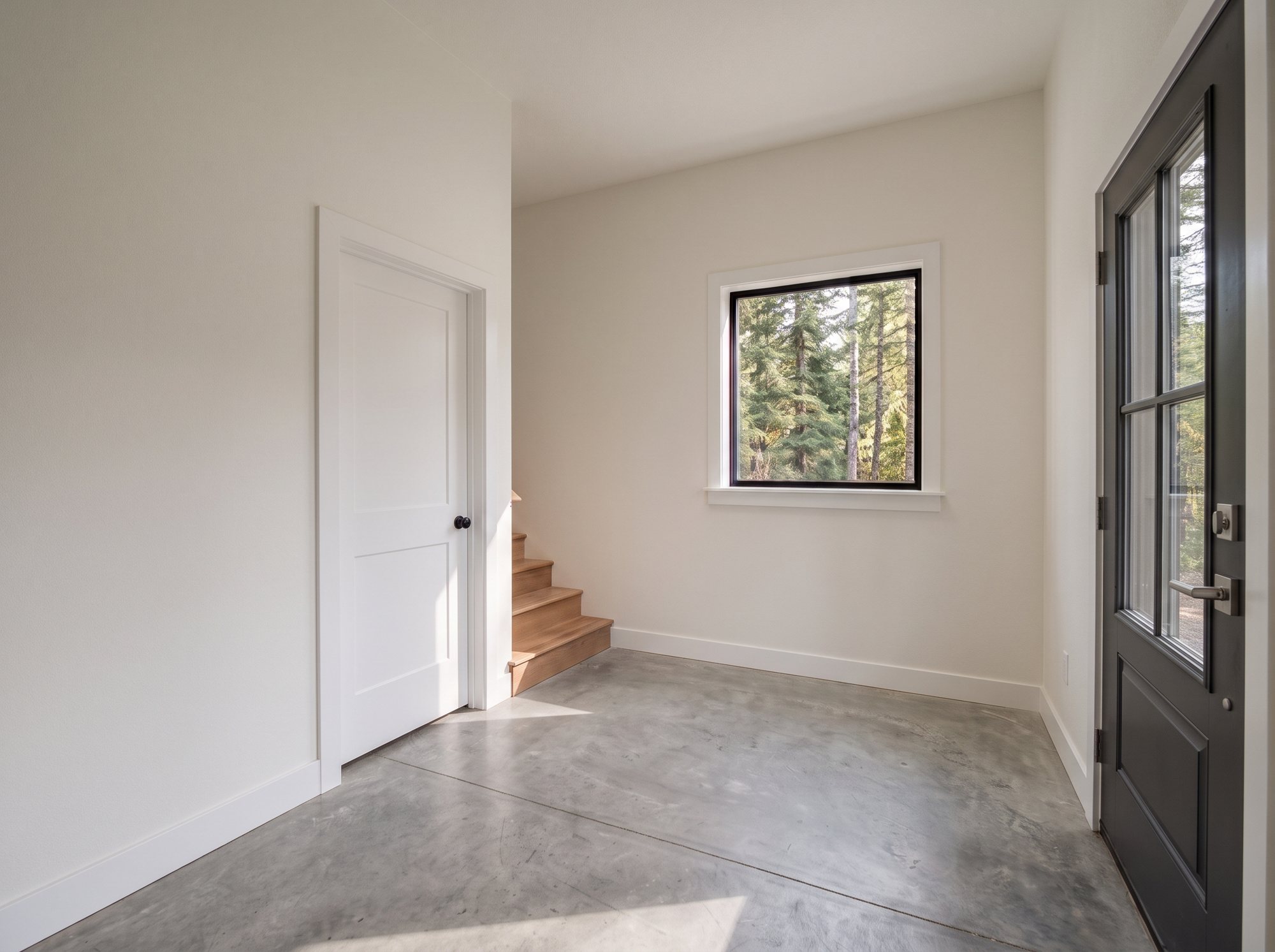 Mt. Bachelor Pad concept rendering: ground-floor entry with stairs up to the living level
